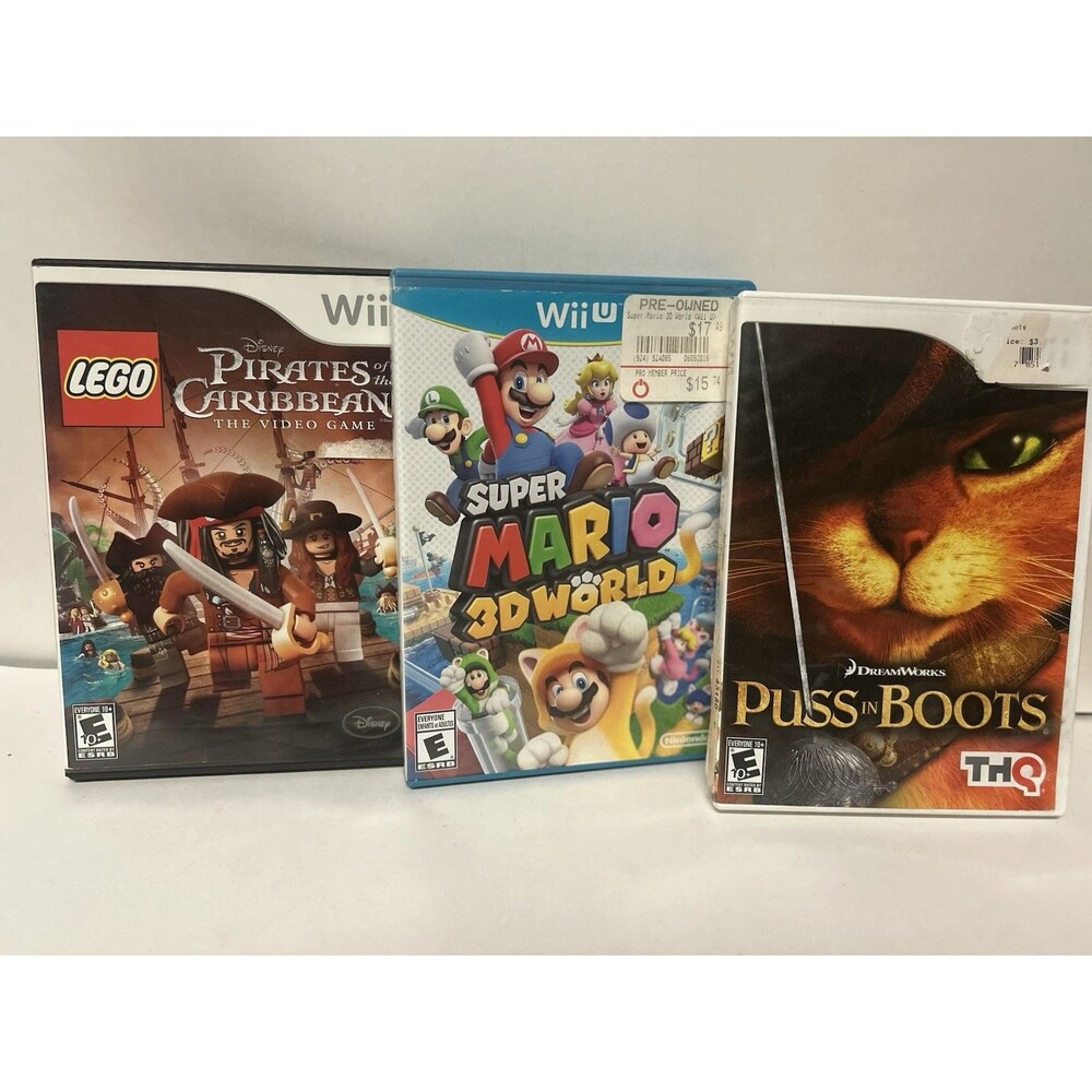 Lot of 3 Wii Games Nintendo Wii U Super Mario 3D - Puss in Boots - LEGO Pirates